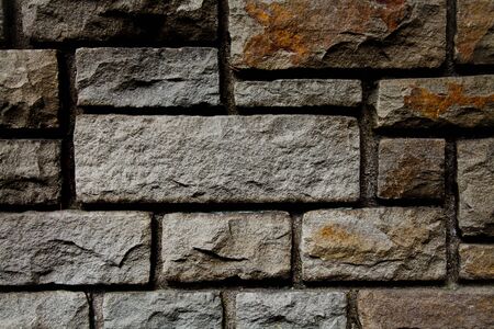 stone wall background with details of grain and linesの写真素材