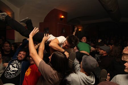 stage dive at indoor concert in romaniaのeditorial素材