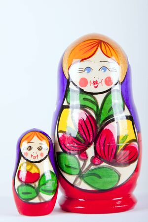 matryoshka couple dalls on a white background smillingの写真素材
