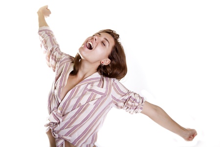 yooung atractive woman yawning in pijamas in the morning with happy faceの写真素材