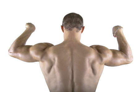 Athletic muscular man bodybuilder posing from behind showing his back