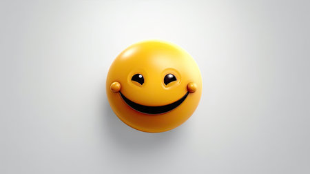 Smiling yellow emoticon on white background.の素材