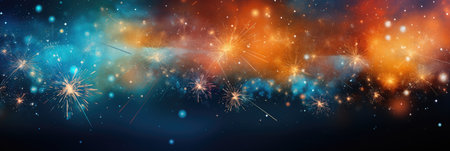 wide banner celebration fireworks on night sky with colorful red and yellow explosionsの素材