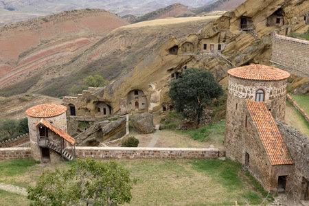 David Gareja monastery complex carved in sandstone mountain of Kakheti region of Georgia on a sunny...