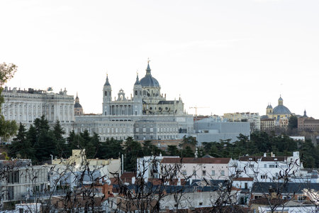 Panoramic view of madrid's historic architecture, including the royal palace and almudena cathedralの写真素材