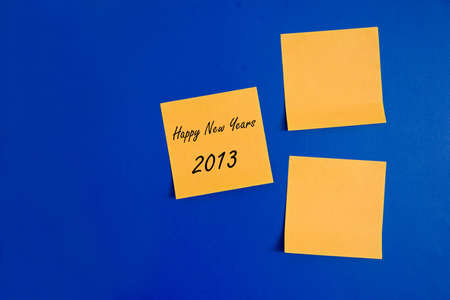 post-it notes on blue blackgroundの写真素材