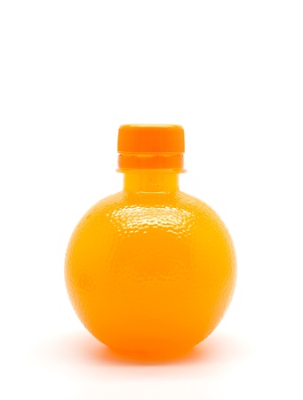 Orange juice in bottle isolated on a white background の写真素材