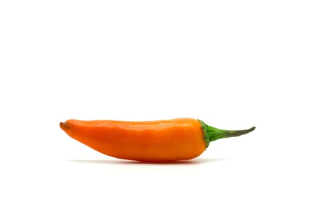 Orangr hot chili pepper isolated on a white background.の写真素材