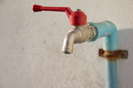 Old tap for cleaningの写真素材