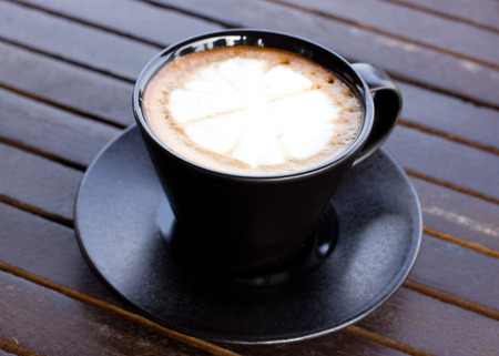 Cup of coffee on table in the morningの写真素材