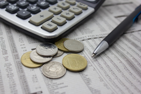 Business background with money, pen and calculator.の写真素材