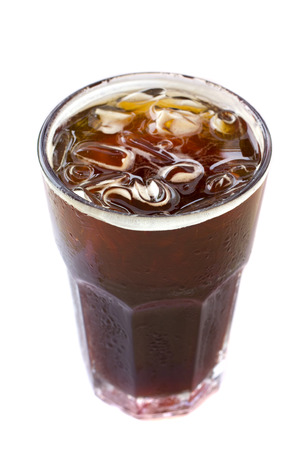 Delicious ice coffee americano on wood table.の写真素材