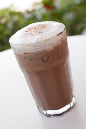 Ice chocolate drink in decorated tall glassの写真素材