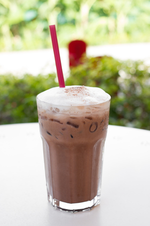 Ice chocolate drink in decorated tall glassの写真素材