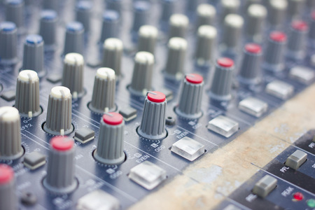 Part of an audio sound mixer with buttons and sliders . の写真素材