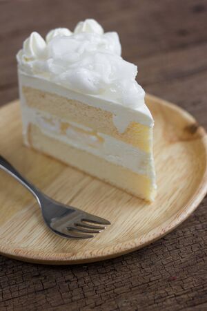a piece of coconut cake on dish.の写真素材