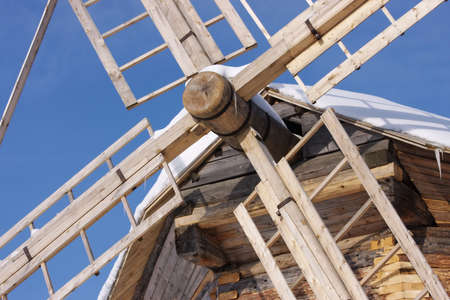blades from a mill on a background skyの写真素材