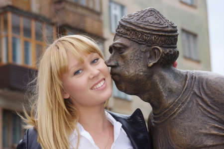 beautiful woman with a sculptureの写真素材