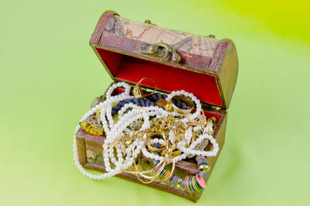 small box with treasures on a light green background