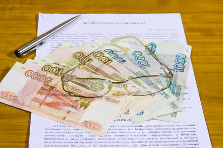 business still life with the contract of work and labourの写真素材