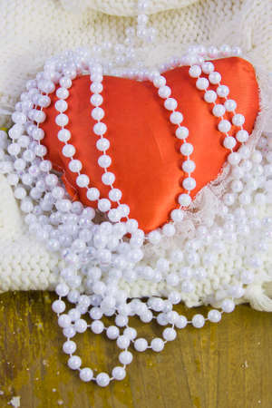 red heart and beads from pearlsの写真素材