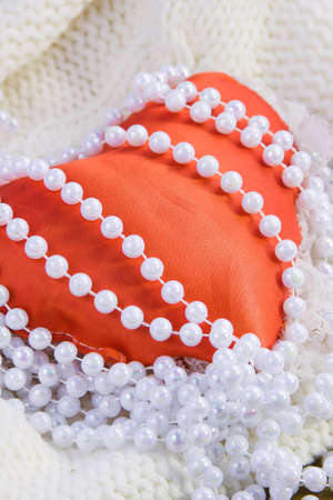 red heart and beads from pearlsの写真素材