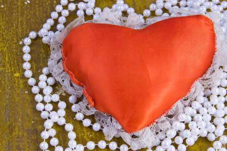 red heart and beads from pearlsの写真素材