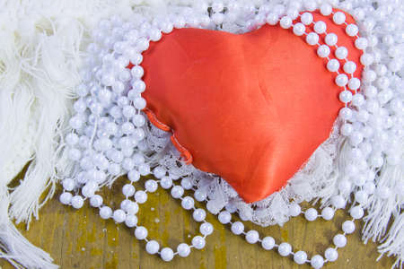red heart and beads from pearlsの写真素材