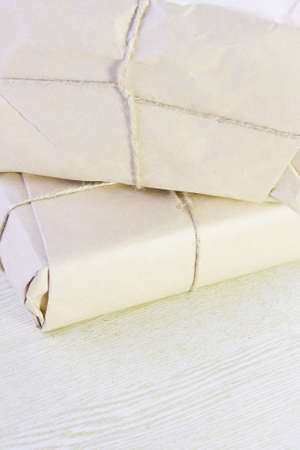 two parcels bandaged by a ropeの写真素材