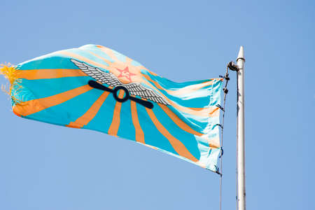 Raising of a flag of aircraft on a background of the blue skyのeditorial素材