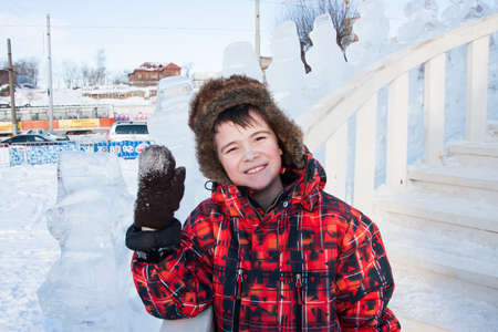 PERM, RUSSIA, Feb, 06.2016: Boy standing on an ice hill, urban esplanade, Lenin Streetのeditorial素材