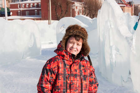 PERM, RUSSIA, Feb, 06.2016: Boy in ice sculptures, urban esplanade, Lenin Streetのeditorial素材