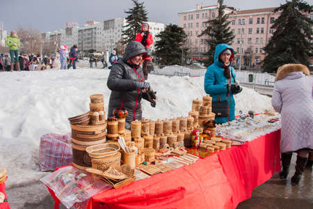 PERM, RUSSIA - March 13, 2016: Trade counters with decorative woodwork on the celebration of Carnivalのeditorial素材