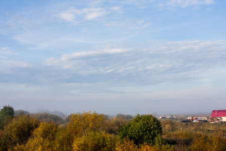Perm, Russia -  Fog over the village early in the morningの写真素材