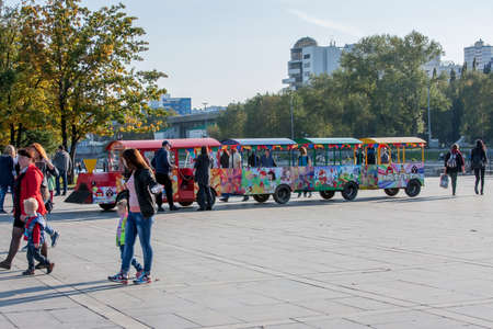 Yekaterinburg, Russia - September 24.2016: Children ride on a steam train ornamented on the waterfrontのeditorial素材