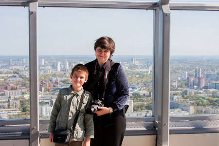 Yekaterinburg, Russia - September 24.2016: Grandmother and grandson on the observation deck 52 floors of the skyscraper Vysotskyのeditorial素材