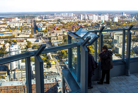 Ekaterinburg, Russia - September 24.2016: People on a viewing platform 52 floors of a skyscraper Vysotsky with a type on cityのeditorial素材