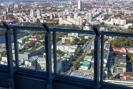 Ekaterinburg, Russia - September 24.2016:  Glass screen on a viewing platform 52 floors of a skyscraper Vysotsky with a type on cityのeditorial素材