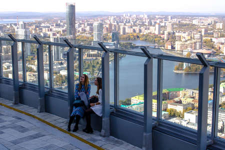 Ekaterinburg, Russia - September 24.2016: People on a viewing platform 52 floors of a skyscraper Vysotsky with a type on cityのeditorial素材