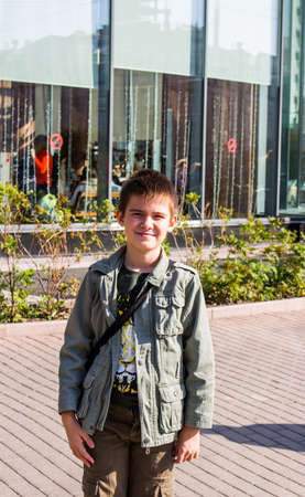 Ekaterinburg, Russia - September 24.2016:  Cheerful boy about business center Vysotskyのeditorial素材