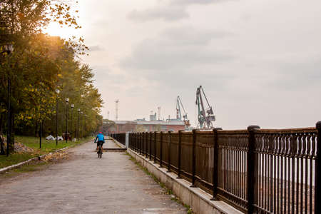 Perm, Russia - September 28,2016: Quay and cargo port on coast of the river of Kama in the evening on a declineのeditorial素材