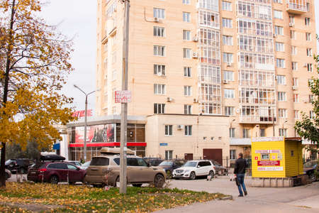 Perm, Russia - September 28.2016:  Autumn city landscape and a parking of cars at shopのeditorial素材