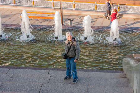 Tyumen, Russia - October 01.2016:  Boy about fountains on quayのeditorial素材