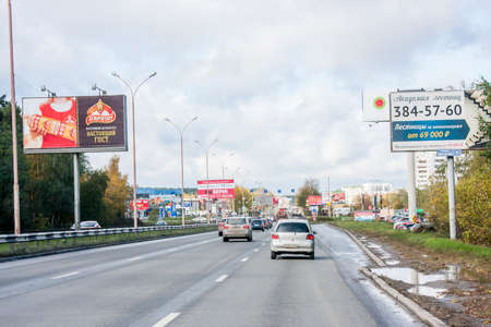 Ekaterinburg, Russia - October 02.2016: Traffic on an automobile line, a city landscapeのeditorial素材