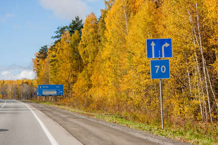 Yekaterinburg, Russia - October 02.2016: Road signs and pointers towards the city along the road in autumnのeditorial素材