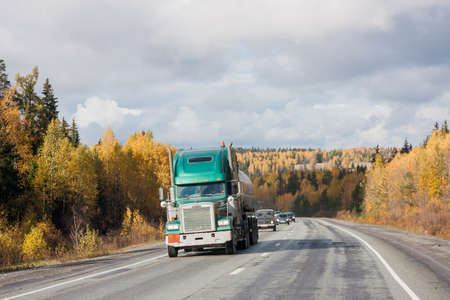 Revda, Russia - October 02.2016: Traffic of cars on a line in an autumn sunny dayのeditorial素材