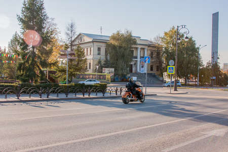 Tyumen, Russia - October 01.2016:  Biker goes on roadのeditorial素材