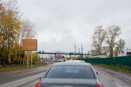Bogdanovich, Russia - October 02.2016: Traffic jam at a railway crossingのeditorial素材