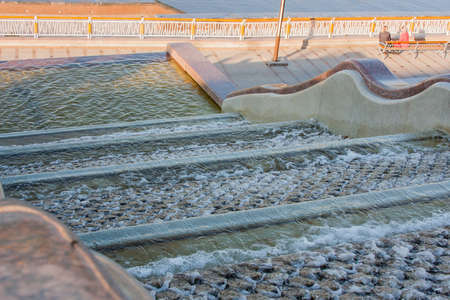 Tyumen, Russia - October 01.2016:  Cascade fountain on quay of the riverのeditorial素材