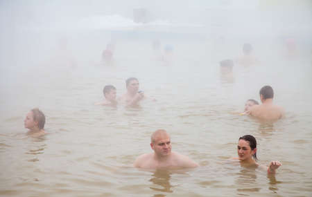 Tyumen, Russia - November 05.2016: People in pool with hot mineral water in winter, a thermal source ' Soviet 'のeditorial素材